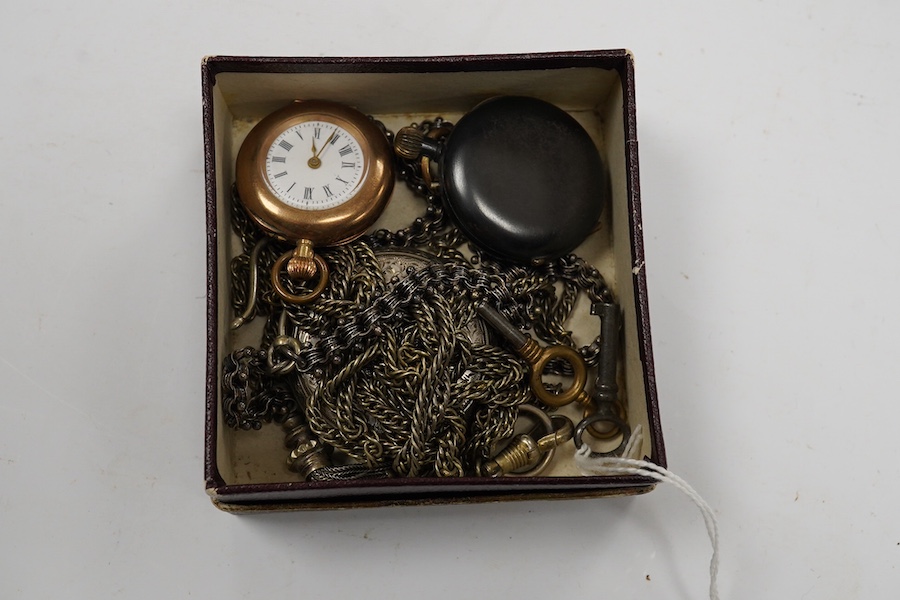 A 9k open faced keyless fob watch, two other fob watches including gun metal and Swiss 935 standard, two fob chains and a watch key. Condition - fair